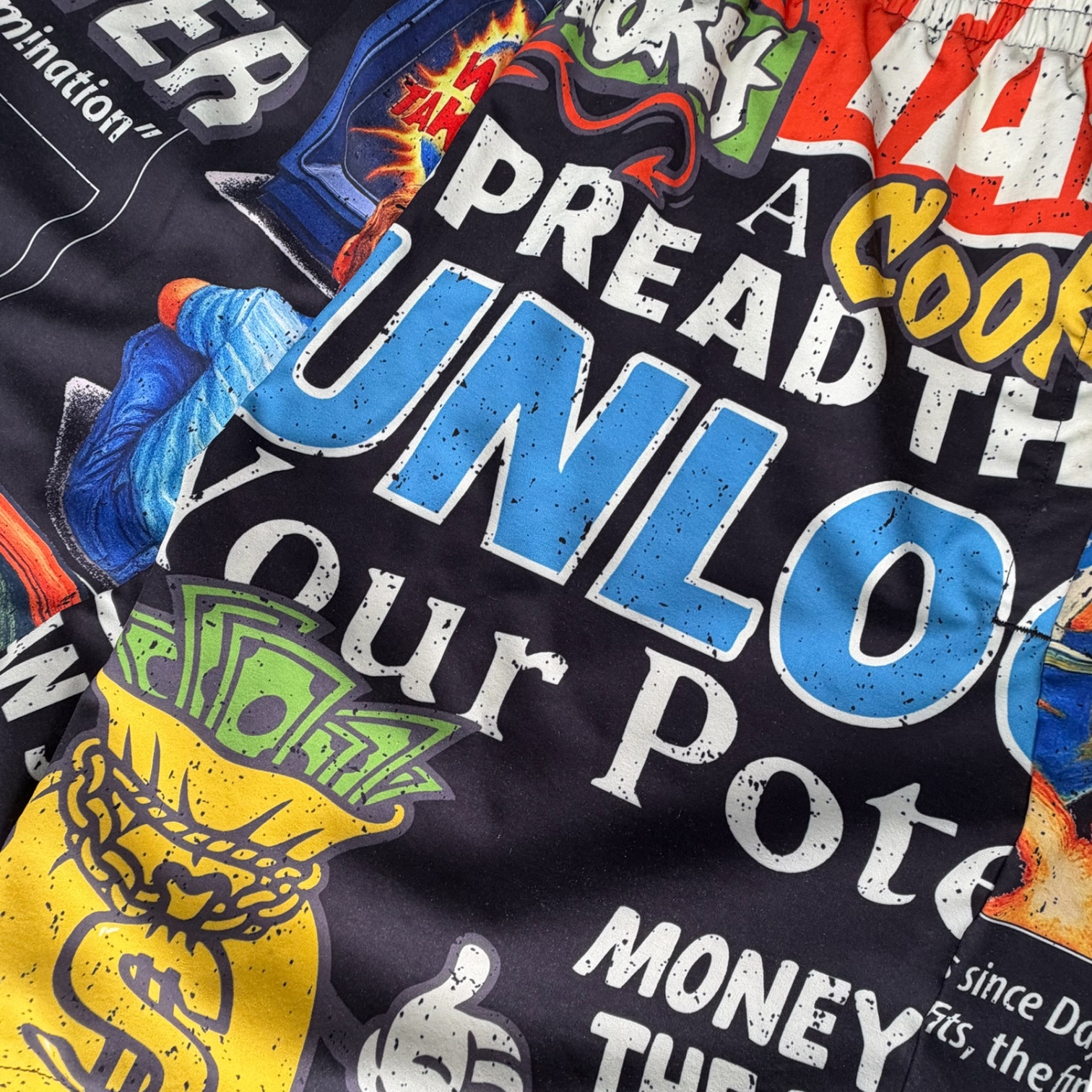 COOKIES SUMMER COLLECTION- NEW MONEY NEWS PRINT SWIM TRUNKS (LARGE)